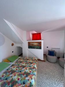 a bedroom with a bed and a couch at Residenza Cà Donzella in Lazise +73 photos