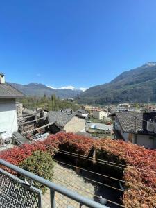 a view of a city with mountains in the background at A Casa di Zio Zeffy in Châtillon