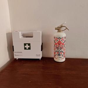 a toaster and a box next to a candle at Nie Samym Chlebem in Poborszów
