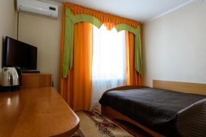 Кровать или кровати в номере Отель Баваренок