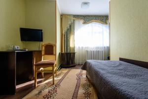 Кровать или кровати в номере Отель Баваренок