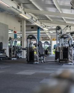 a gym with rows of machines in a building at Sporting Lodge Inn Middlesbrough in Middlesbrough