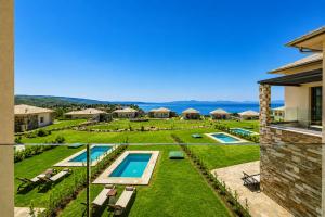 an aerial view of a yard with a swimming pool at LEOLIA Nautical Resort Kala Nera - Handwritten Collection in Volos