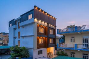 a building with lights on top of it at Perfectstayz AIIMS near Aiims Hospital in Rishīkesh