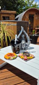 a table with a plate of food on a table at L'Esprit Zen #air conditioning #spa in Nercillac