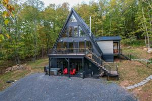 a house with a gambrel roof on top of it at Stunning New Construction Modern Beautiful in McHenry