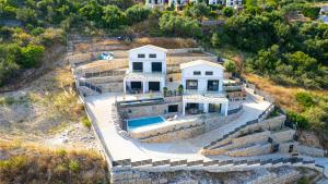 an aerial view of a house on a hill at Aifantis Villa 2 in Póndi