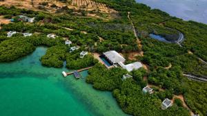 an aerial view of a house on a island in the water at Dutch Bay Resort & Spa in Kalpitiya