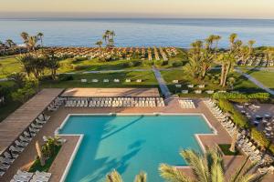 an aerial view of a resort with a swimming pool and the ocean at Impressive Playa Granada Golf in Motril