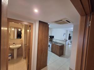 a bathroom with a sink and a toilet in a room at Moncofa Beaches Apartment in Moncófar +44 photos