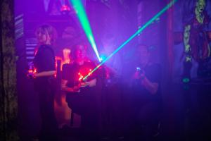 a group of people standing in a room with lasers at Lalandia Rødby in Rødby +56 photos