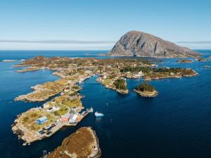 an aerial view of an island in the ocean at Batalden Ishus in Kinn