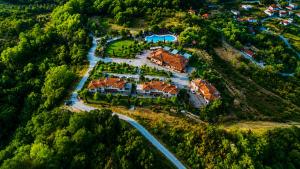 an aerial view of a house on a hill at Hotel Epavlis in Káto Poróïa +57 photos