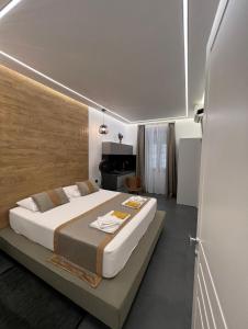 a bedroom with a large bed in a room at Luxury Marina apartments in Rijeka