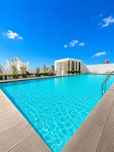 a swimming pool on top of a building at Peaceful Studio at The Median - City Skyline View, Short Walk to IT Park in Cebu City