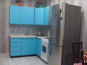 A kitchen or kitchenette at Apartments 30 micro-district, 9