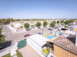 an aerial view of a town with a parking lot at Luxury Private Pool Villa Campoverde in Pinar de Campoverde