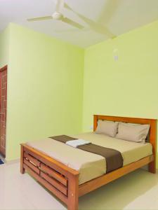 a bedroom with a bed in a room at RASHI Lodge Attibale in Attibele
