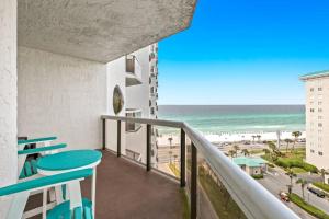 a balcony with a view of the beach at Gorgeous and well appointed efficiency with shared pool and beach access in Destin