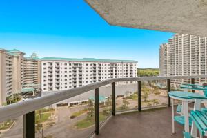 a balcony with a view of a building at Gorgeous and well appointed efficiency with shared pool and beach access in Destin +32 photos