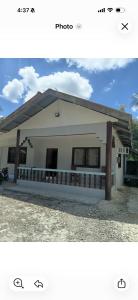 two pictures of a small white house at Dorz Inn in Moalboal