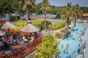 an overhead view of a pool at a resort at Camping Pays Basque in Bidart