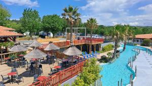 an aerial view of a pool at a resort at Camping Pays Basque in Bidart