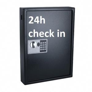 a black refrigerator with the words check in at P63 City Rooms Nürnberg Center in Nuremberg