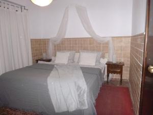 Posteľ alebo postele v izbe v ubytovaní Casa La Madriguera