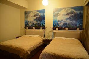 Postel nebo postele na pokoji v ubytování Kingship Hotel Kaohsiung Inter Continental
