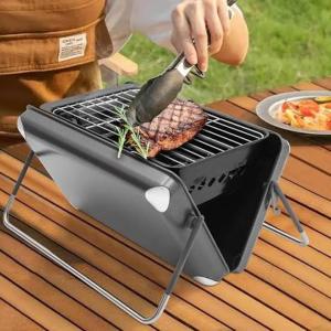 a person is cooking meat on a grill at Helle Sonne in Agarone