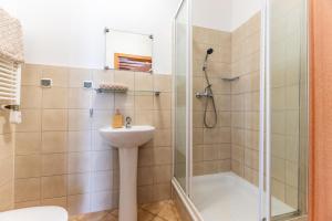 a bathroom with a shower and a sink at Pensjonat Stokłos in Duszniki Zdrój +53 photos