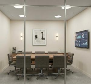 a conference room with a large wooden table and chairs at Pérola Suítes Boutique Hotel in Luanda