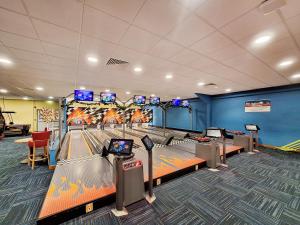 a bowling alley with pins and a game room at The Knott - Uk49161 in Silverdale