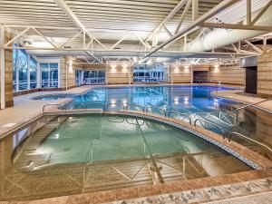 a large indoor swimming pool in a building at The Knott - Uk49161 in Silverdale