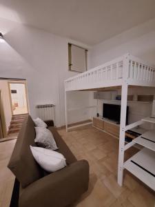 a living room with a bunk bed and a couch at Casa Conti Trivelli 2 in Vasto