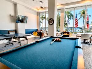 a billiard room with a pool table at Luxury Skyline Apartment- Resort-Style Pool , Gym & Game Room in Fort Myers