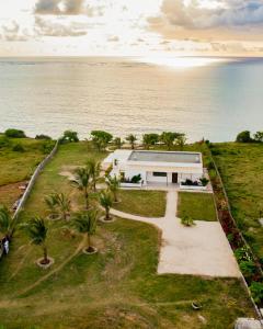 an aerial view of a house on the beach at Villa Kweli - Private Ocean Front Villa in Tongoni