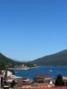 a view of a city and a body of water at Astra Apartment in Meljine