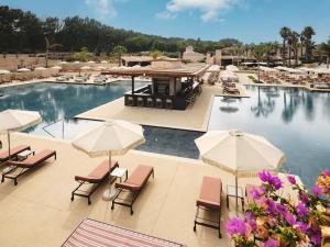 an image of a pool at a resort at Mangia's Costa Ragusa Borgo - New Opening in Scoglitti