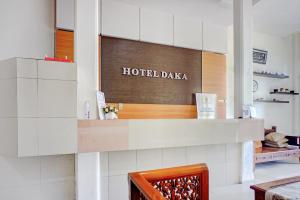 a store with a sign that reads hotel daza at Hotel O Kuta Alam Near Masjid Oman Al-Makmur Formerly Daka Hotel in Lheue