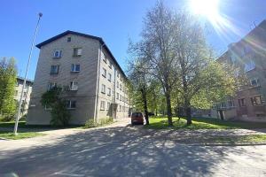 a car is parked in front of a building at Border Madise Apartment, Madise tn 8, Apt 7, Narva in Narva