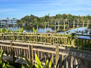 a wooden bridge over a body of water at 2 bedroom luxury apartment in Nuevo Nayarit +6 photos