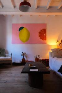 a living room with a couch and a table at Cal Mengo in La Vega +21 photos