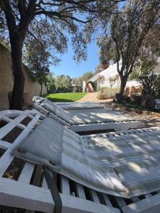 a group of beds sitting on top of a bench at Minnanni in San Pantaleo