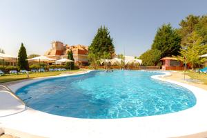 a swimming pool at a resort at San Marcos Salnés in Cambados