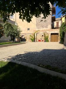 an empty street with a building in the background at Dimora di Duen - Villa Storica di Charme in Villa San Giovanni