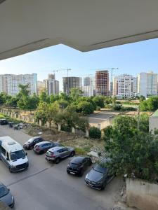 a group of cars parked in a parking lot at casa jihan playa TGV in Tangier