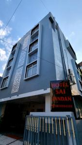 a building with a sign that says no fat san ramadan at Hotel Sai Vandan in Nagpur