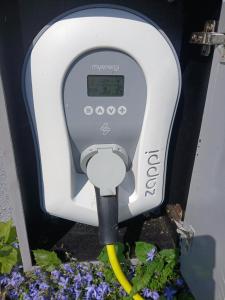 a parking meter with a yellow hose sticking out at Conways B&B in Claremorris